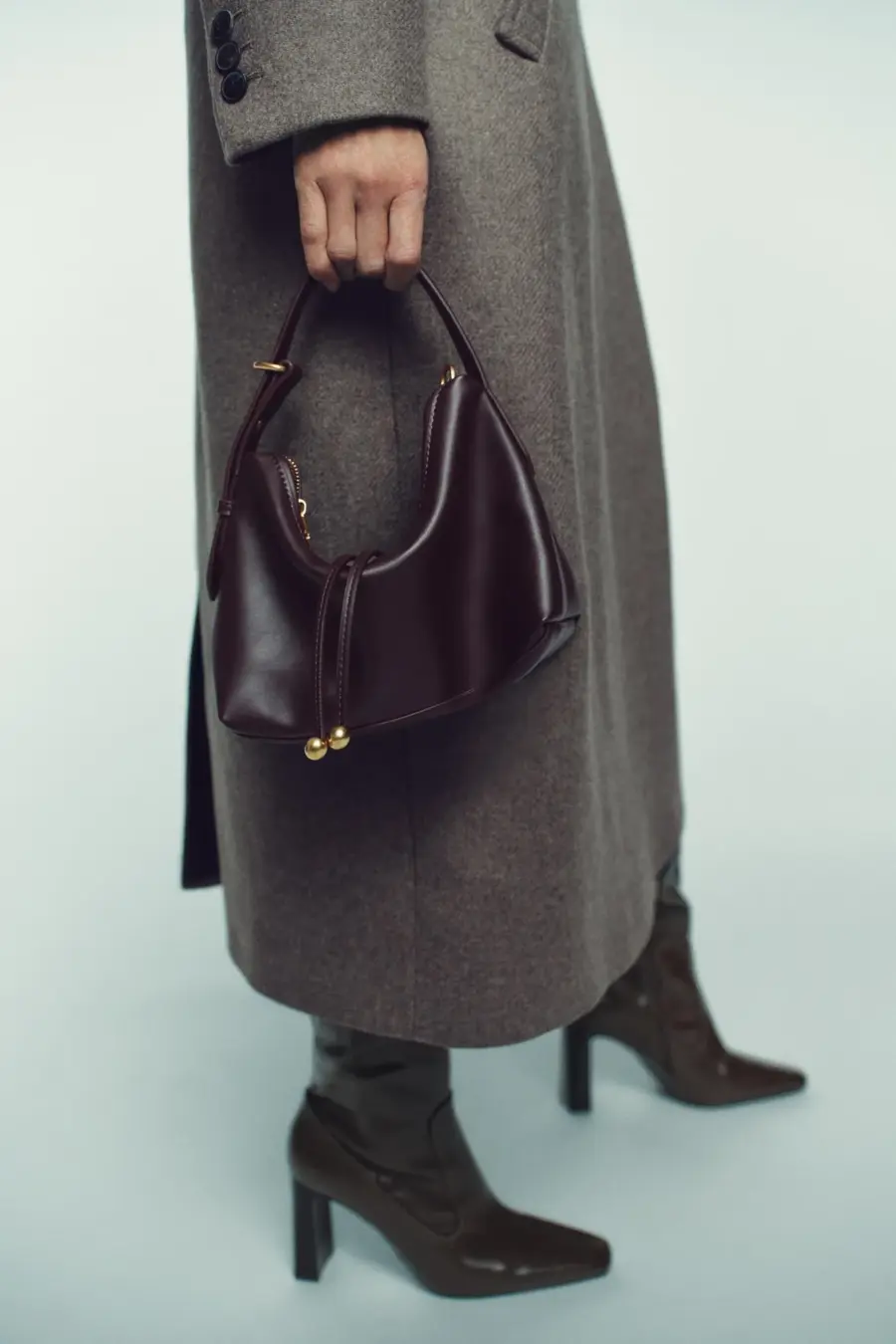 MINI BUCKET BAG WITH BALL DETAIL