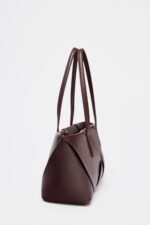 WOVEN ELONGATED HANDBAG