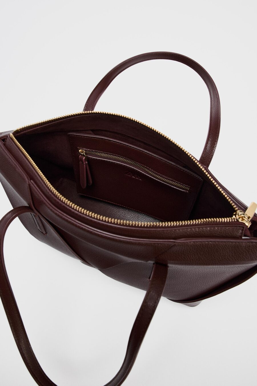 WOVEN ELONGATED HANDBAG