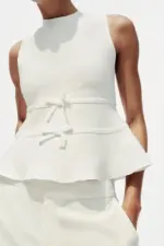 KNIT PEPLUM TOP WITH TIES