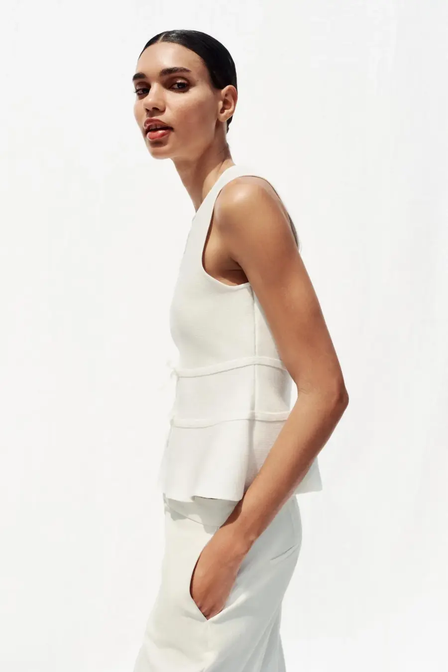 KNIT PEPLUM TOP WITH TIES