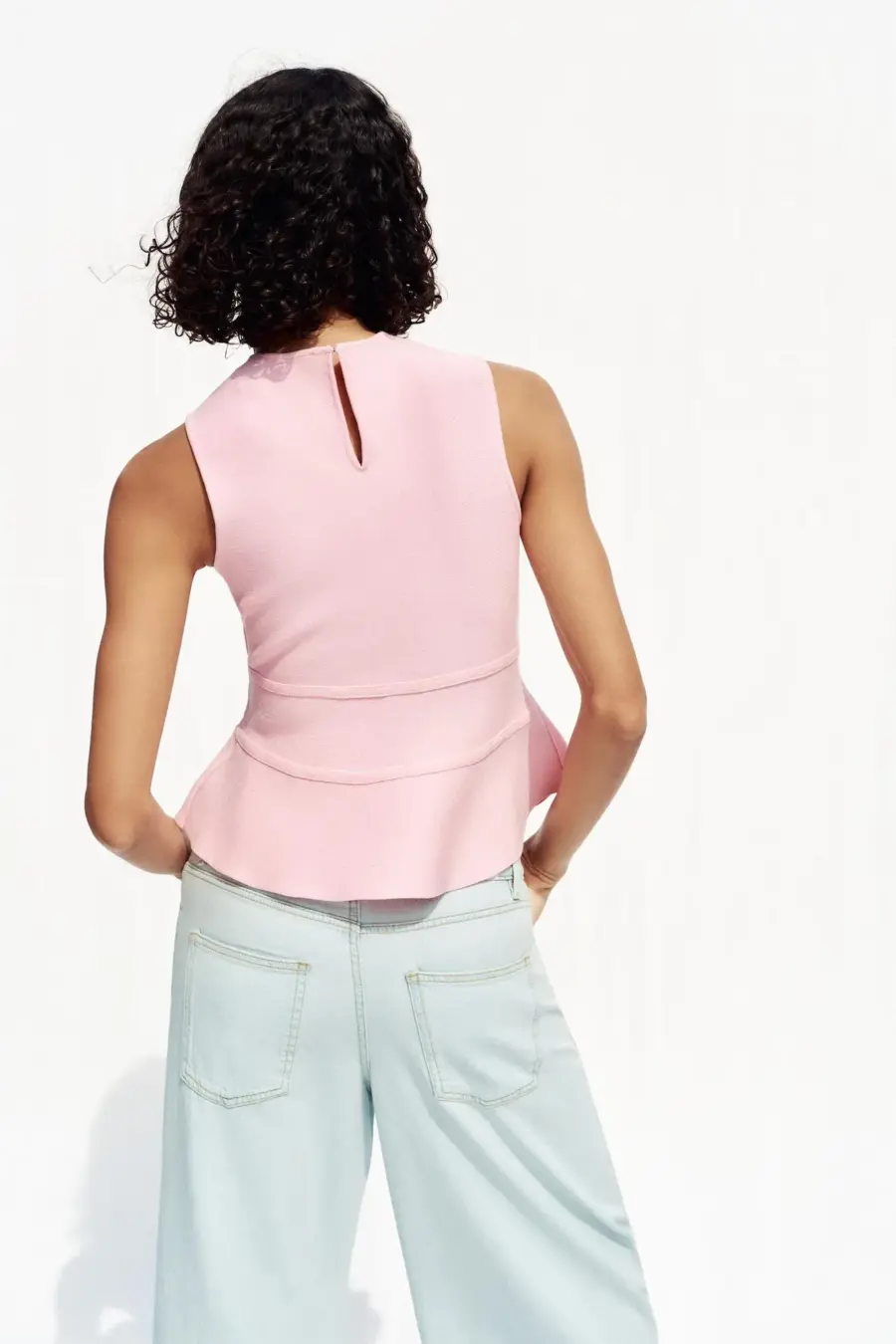 KNIT PEPLUM TOP WITH TIES