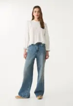 Loose blouse with ruffles
