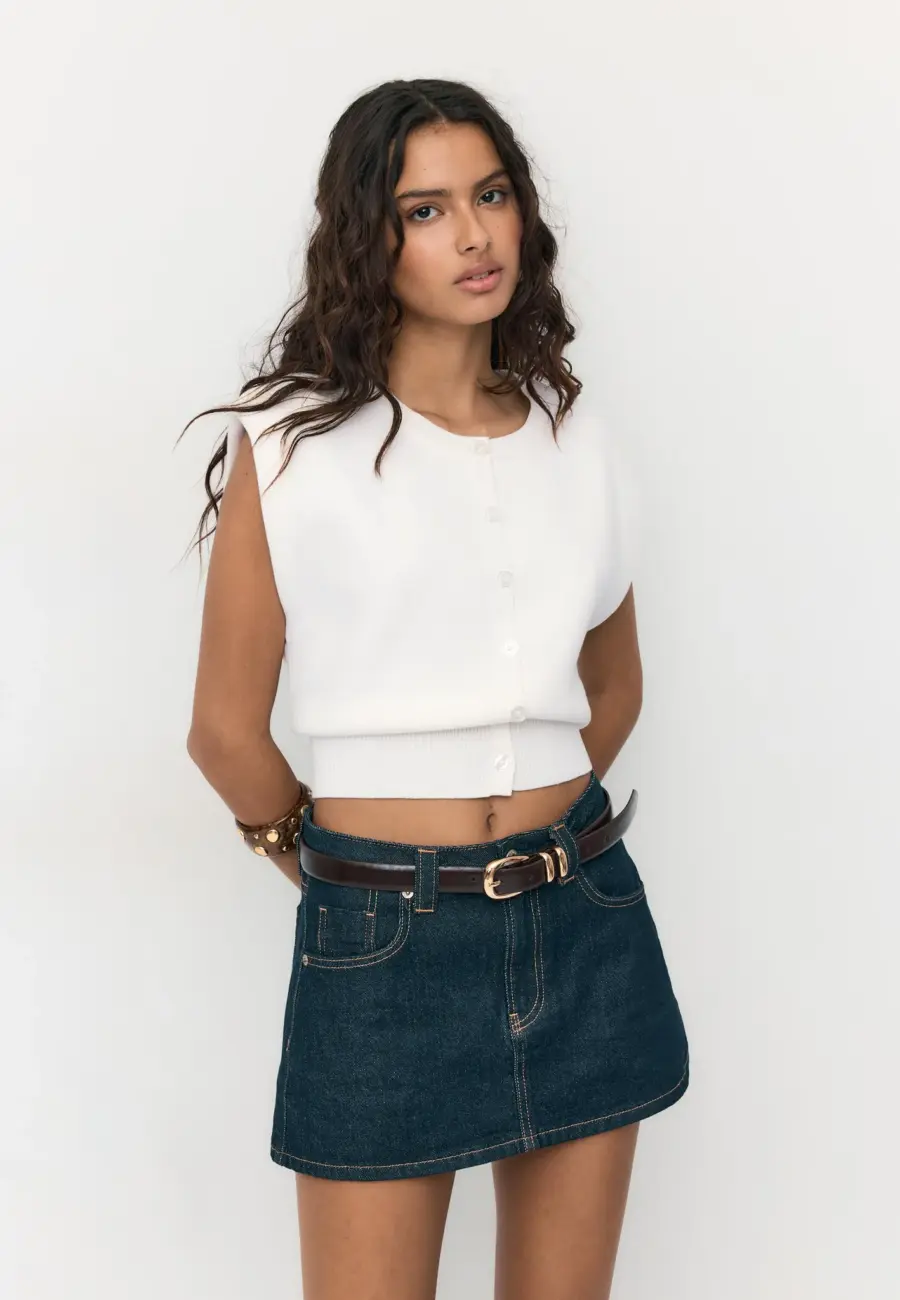 Knit vest with padded shoulders