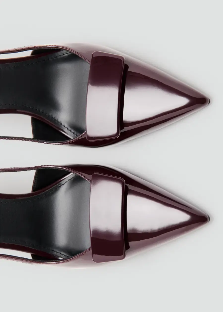 Patent heeled shoes