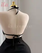 فستان اسود قماش لميع بحلي الجسم