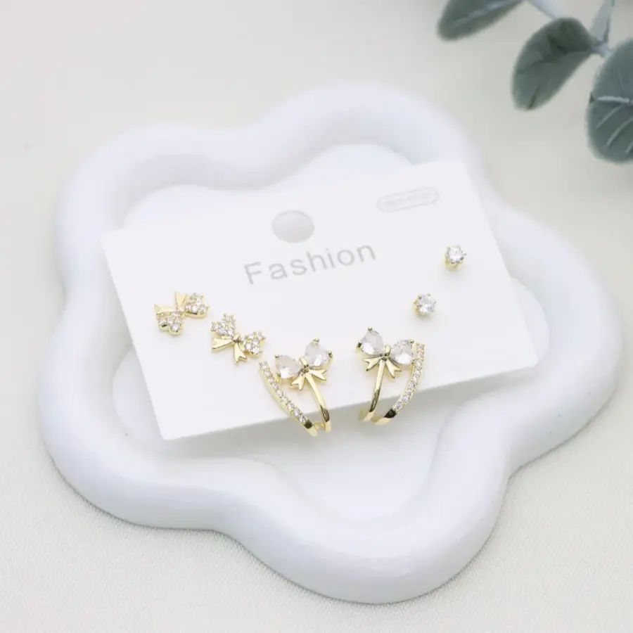 مجموعة أقراط فيونكة ذهبية