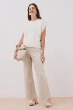 Vest with side buttons