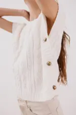 Vest with side buttons