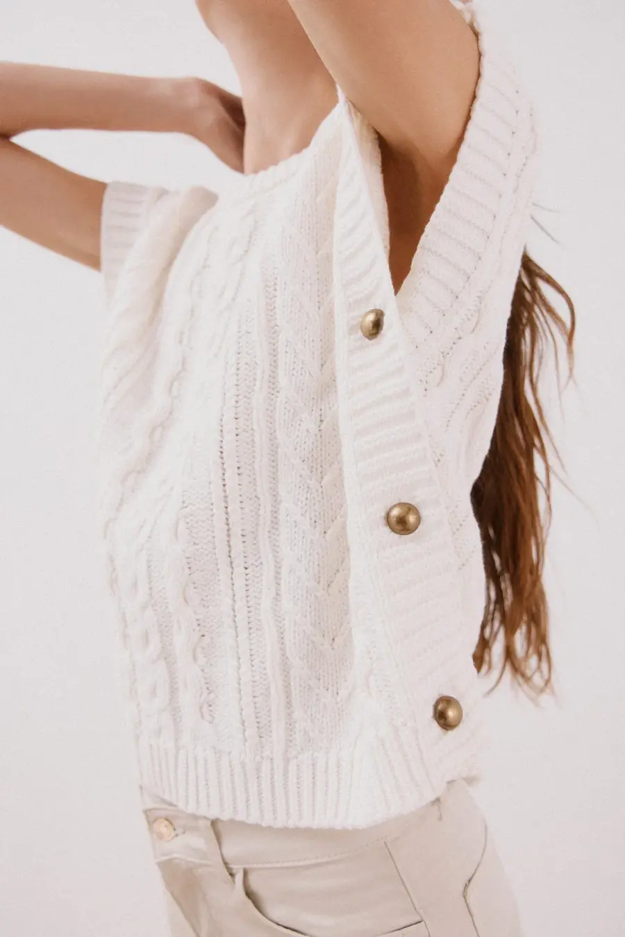 Vest with side buttons