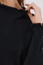 Ruffled neck sweater