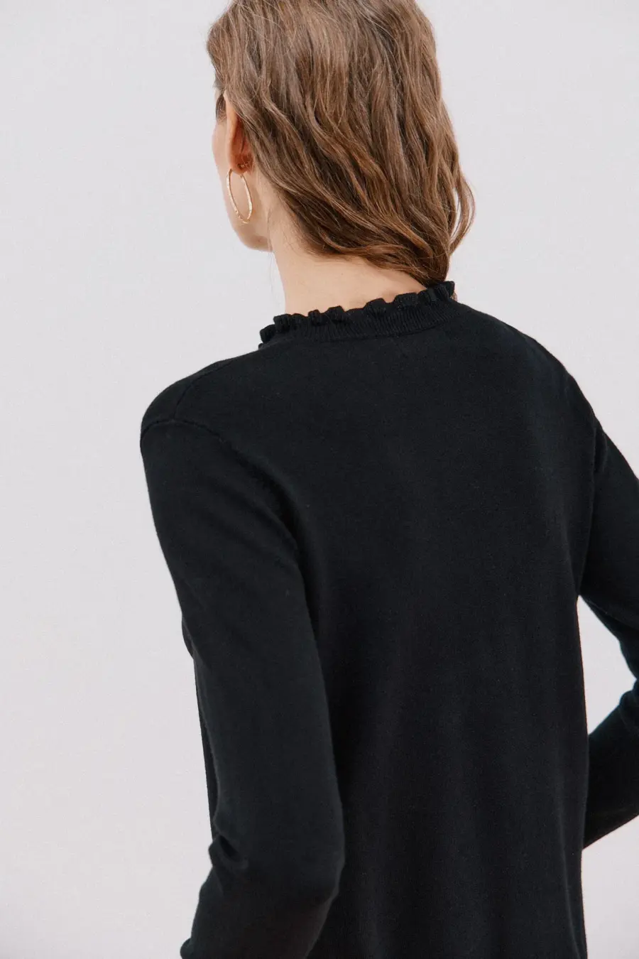 Ruffled neck sweater