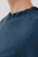 Ruffled neck sweater