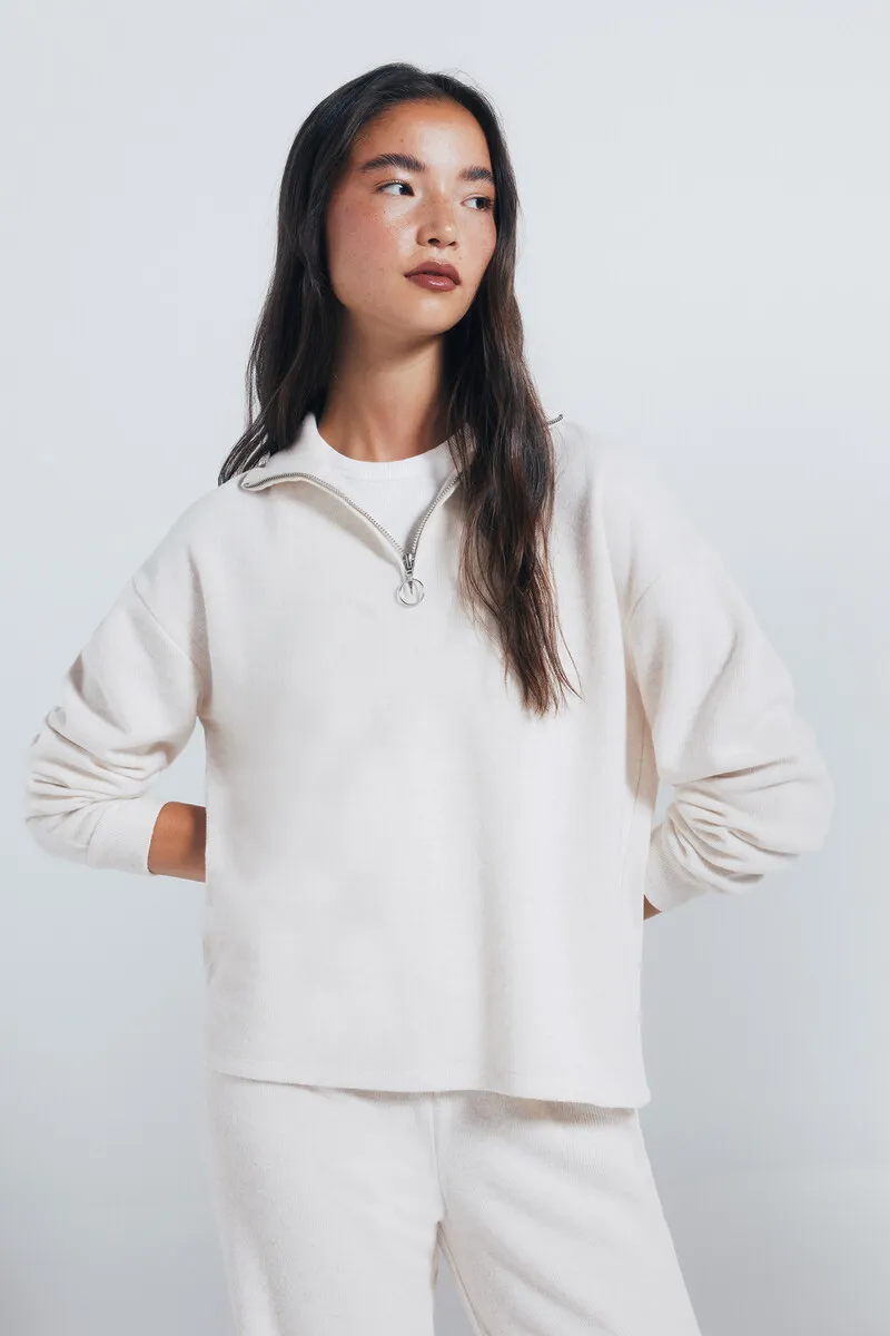 Zip-up turtleneck sweatshirt