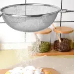 مصفاية ستانلس يد خشب
